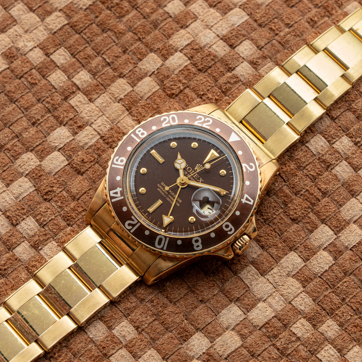 ROLEX GMT-MASTER REF. 1675 FIRST-SERIES LACQUERED BROWN NIPPLE DIAL 1971's