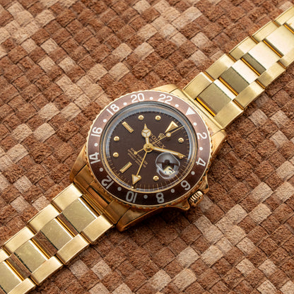 ROLEX GMT-MASTER REF. 1675 FIRST-SERIES LACQUERED BROWN NIPPLE DIAL 1971's